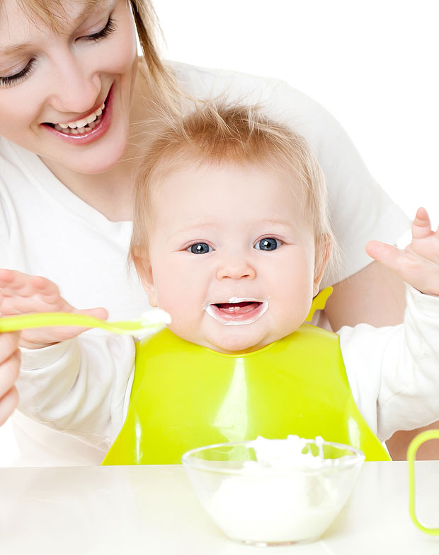 Happy baby feeding